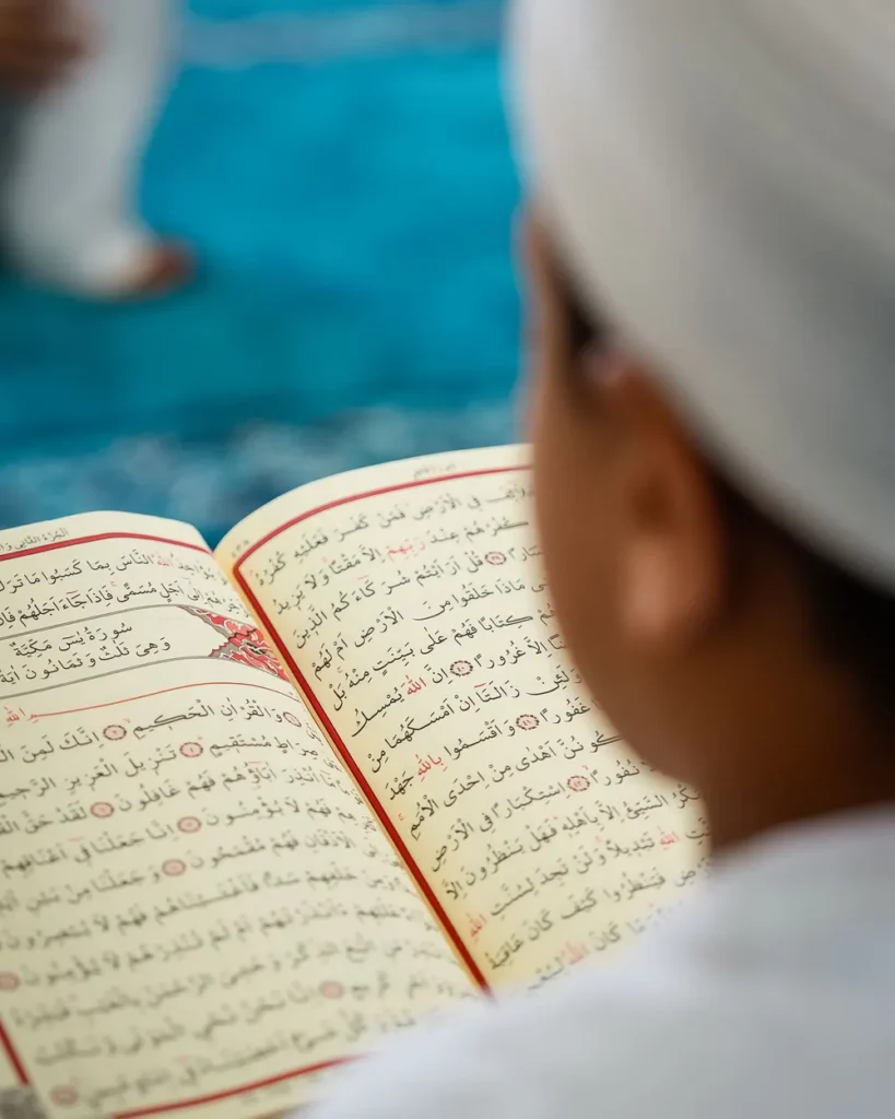 Boy reciting the Quran with Tajweed